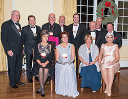 Pictured are members of the 2015 Legatus of Indianapolis board of directors. Seated, from left, Carmel Brand, secretary; Terry Langsenkamp, program chair; Tina Malone, trustee; and Kathryn Densborn, past-president. Standing are George Maley, founder emeritus; Tim Rushenberg, trustee; Msgr. Joseph Schaedel, chaplain; Tom Penno, president; Kevin McCarthy, membership chair; Pat Carr, treasurer; Tom Spencer, ex-officio, and Jim Zink, trustee. (Photo by Rhythm in Focus)