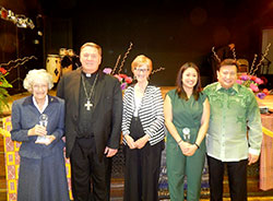 Three individuals were honored for their outstanding service to the archdiocese’s mission of intercultural ministry on April 23 in Indianapolis. Pictured are honoree Franciscan Sister Norma Rocklage, left, Archbishop Joseph W. Tobin, keynote speaker Annette “Mickey” Lentz, and honorees Guadalupe Pimentel Solano and Marlon Alfonso. (Photo by Mike Krokos)