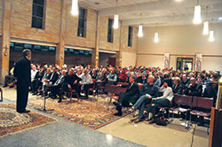 Jesuit Brother Guy Consolmagno, director of the Vatican Observatory, gives a presentation on astronomy and faith on Feb. 7 at Brebeuf Jesuit Preparatory School in Indianapolis. (Photo by Sean Gallagher)