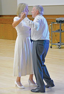 Stella and Elbert Wilson enjoy a dance at a reception in the Archbishop Edward T. O’Meara Catholic Center in Indianapolis after the archdiocese’s 37th annual Wedding Anniversary Mass on Aug. 29 across the street at SS. Peter and Paul Cathedral. Married for 65 years, the Wilsons are members of St. Mark the Evangelist Parish in Indianapolis. (Photo by Natalie Hoefer)