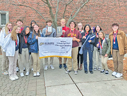 Members of the Spell Bowl team of Roncalli High School in Indianapolis are all smiles as they celebrate the school’s third consecutive Indiana State Class 2 Championship. (Submitted photo)