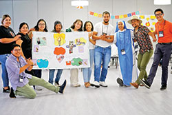 As part of an exercise, participants at the Fe y Vida (Faith and Life) Institute at Lewis University in Romeoville, Ill., in June were separated into groups outside their diocese or archdiocese. Pictured at far right in an orange polo shirt is Jose Quintana of St. Patrick Parish in Indianapolis, a member of the archdiocese’s Pastoral Juvenil Leadership Team. He is also a sub-leader of the group. (Submitted photo)