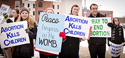 Priests participate in the March for Life: South Bend including, near right, Father Bob Lengerich of St. Dominic Church, Bremen, and Father Chris Lapp, parochial vicar at St. Matthew Cathedral in South Bend and chaplain at Marian High School.