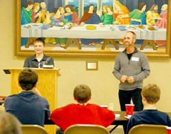 Jerry Steckler and son Isaac, play Father-Son charades at an event sponsored by Catholic Charities of the Diocese of Evansville.